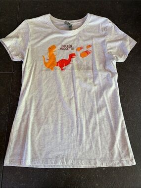 Tee Public White Tee with Orange & Red Dinosaur Graphic - Chicken Nuggets